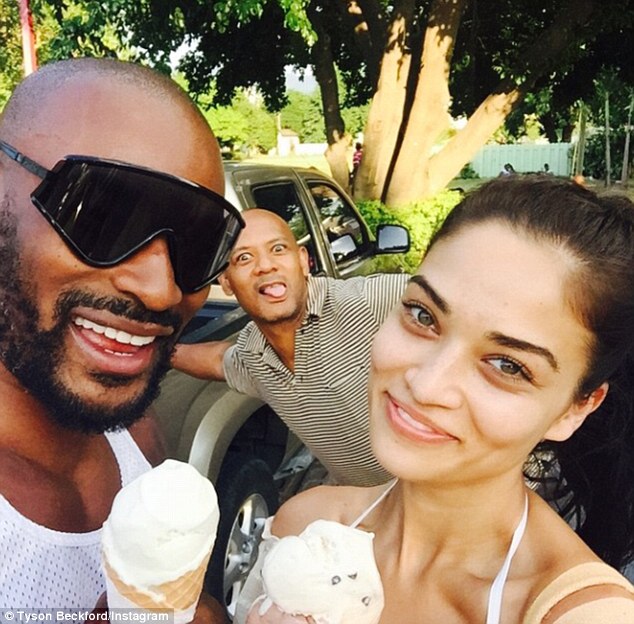246607CD00000578-2895885-His_turn_The_pair_are_spending_time_with_Tyson_s_family_after_en-a-10_1420349635807.jpg