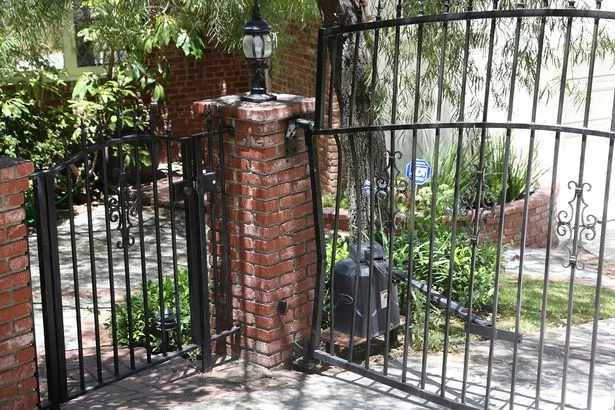 The-damaged-gate-at-the-home-of-Anton-Yelchin.jpg