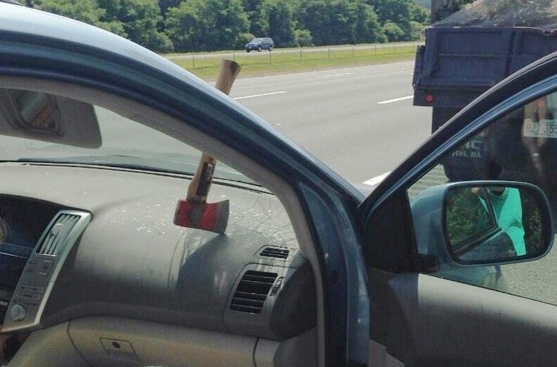 flying-axe-embedded-in-dash-of-unfortunate-but-lucky-car_100474325_l.jpg