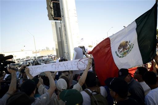 protesters-clash-with-donald-trump-supporters-shortly-after-the-a-donald-trump-rally-ended-in-phoenix-ariz-on-saturday-june-18-2016-several-arguments-sparked-as-the-two-groups-crossed-paths-throughout-the-day-but-city-officials-stepped-in-to-disperse-crowds-if-they-became-too-heated-trump-railed-saturday-against-efforts-by-some-frustrated-republicans-planning-a-last-ditch-effort-to-try-to-thwart-him-from-becoming-the-partys-nominee-threatening-at-one-point-to-stop-fundraising-if-republicans-dont-rally-around-him-ap-photobeatriz-costa-lima.jpg