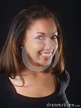 young-black-woman-with-big-smile-and-braces-thumb4404300.jpg