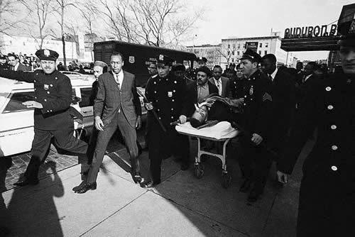 malcolm-x-assassinated-escorted-by-nypd-022165-2.jpg