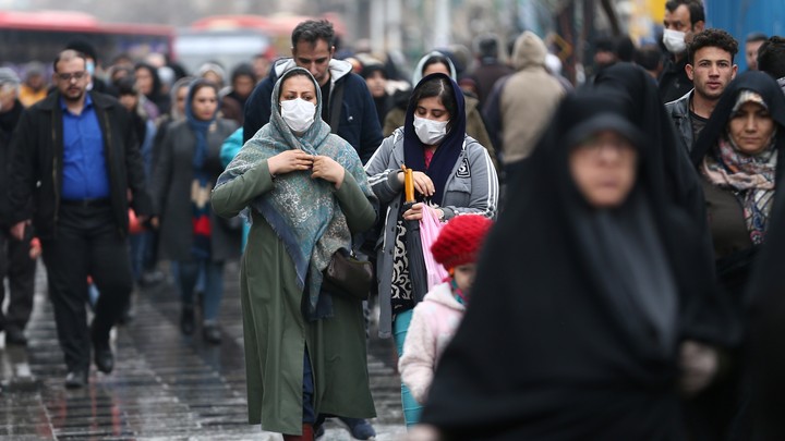 People in Iran wearing face masks