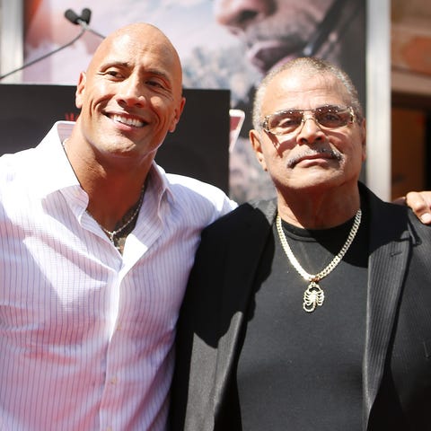 dwayne-the-rock-johnson-and-his-mom-and-dad-at-the-hand-news-photo-474032514-1551898945.jpg