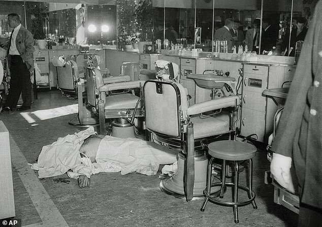 11003558-6810199-In_1957_Albert_Anastasia_lies_on_the_floor_of_the_barbershop_at_-a-4_1552599893509.jpg