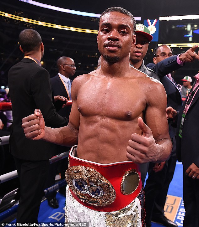 11095890-6818721-Errol_Spence_Jr_celebrates_the_successful_defence_of_his_IBF_wel-a-14_1552809307472.jpg