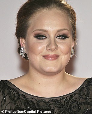 28111752-8295935-Adele_with_a_fuller_face_at_the_BRIT_Awards_2011-a-2_1588848870072.jpg