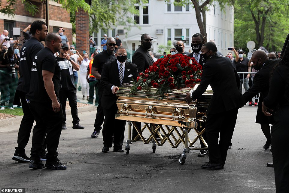 29235936-8389625-George_Floyd_s_casket_leaves_the_sanctuary_at_North_Central_Univ-a-28_1591303450016.jpg