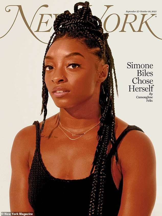 48458471-10033537-Candid_Simone_Biles_24_admitted_in_a_new_cover_interview_with_Ne-a-4_1632764306859.jpg