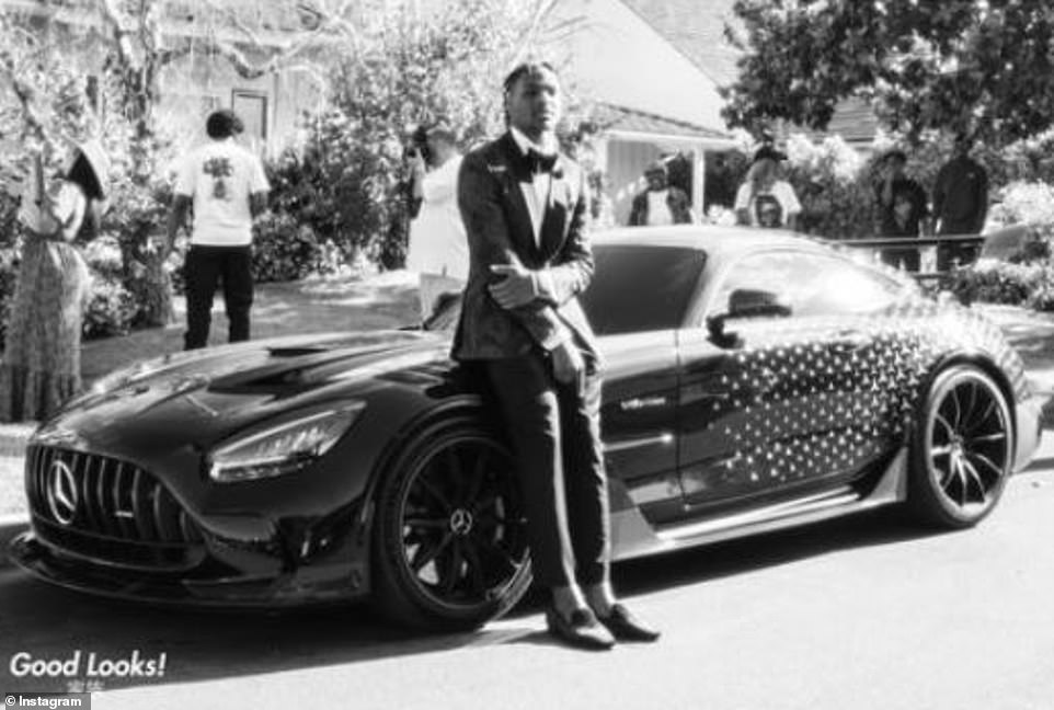 58020545-10833483-Bronny_drove_himself_and_his_date_to_the_prom_in_a_black_Mercede-m-68_1652970369337.jpg