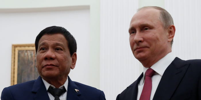 Russian President Vladimir Putin shakes hands with Philippine President Rodrigo Duterte during their meeting at the Kremlin in Moscow, Russia, May 23, 2017. REUTERS/Maxim Shemetov