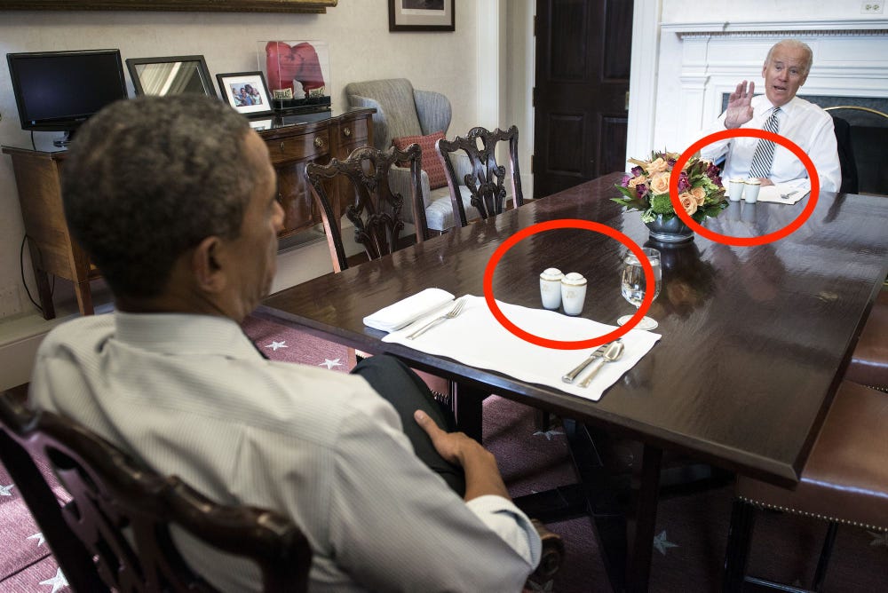 Former President Barack Obama (L) and former Vice President Joe Biden talk before lunch in the private dining room at the White House January 8, 2014 in Washington, DC.