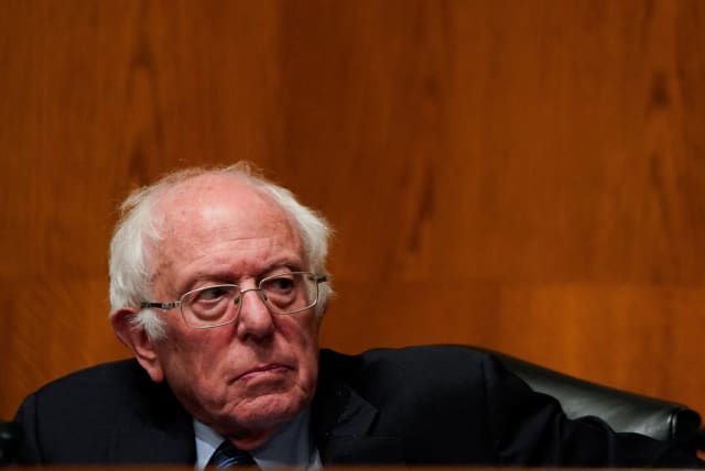  U.S. Senator Bernie Sanders (I-VT) listens during a Senate Health, Education, Labor and Pensions committee hearing titled “Standing Up Against Corporate Greed: How Unions are Improving the Lives of Working Families” on Capitol Hill in Washington, U.S., November 14, 2023.  (photo credit:  REUTERS/Elizabeth Frantz)