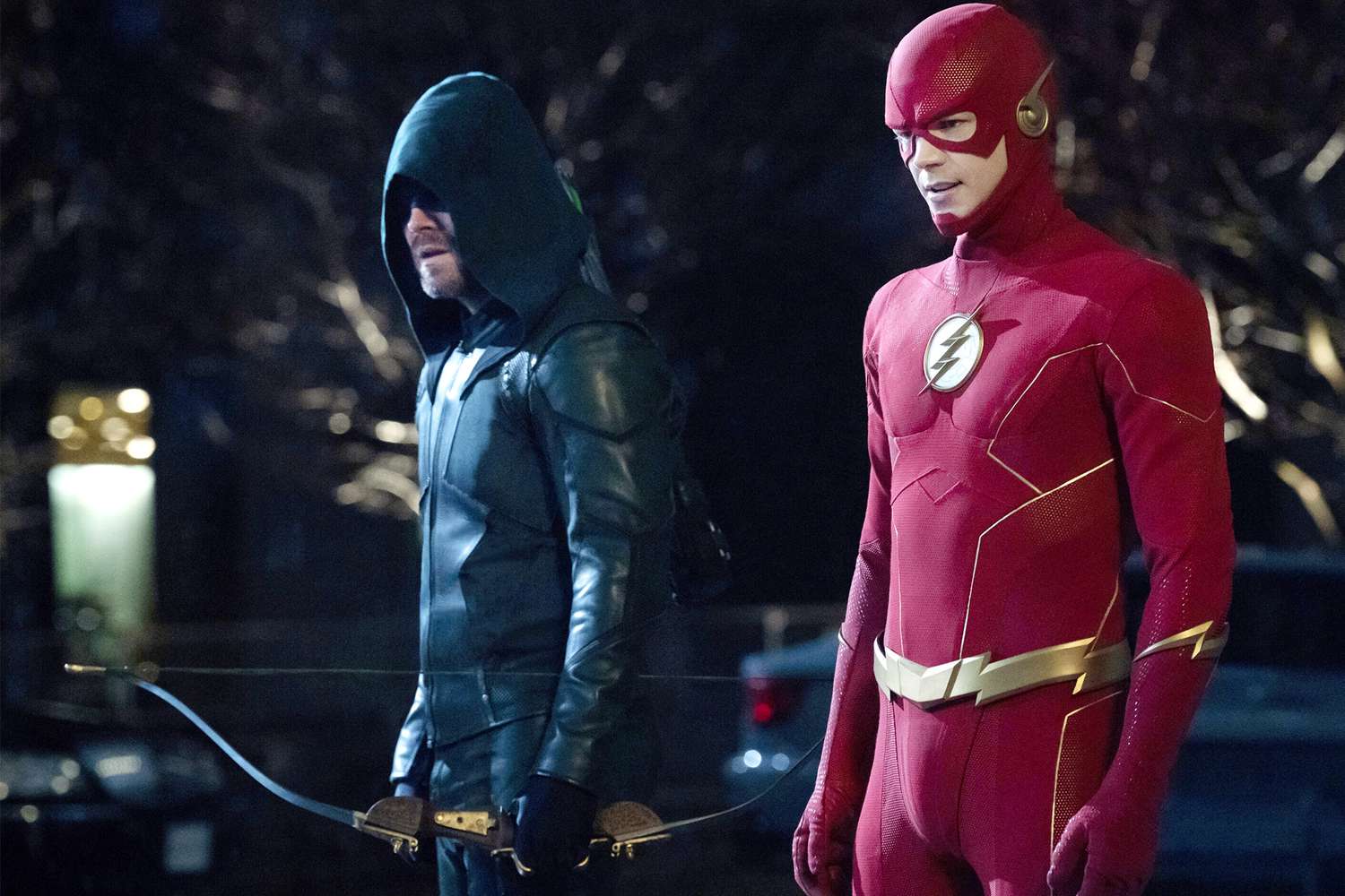 Stephen Amell as Green Arrow and Grant Gustin as the Flash
