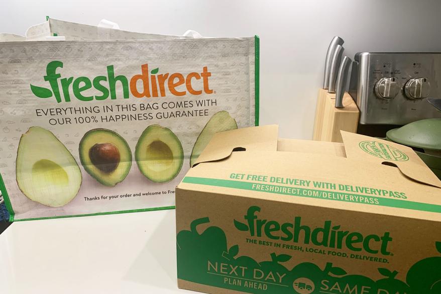 A bag and box of Fresh Direct groceries