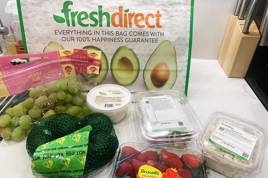 A bag and box of Fresh Direct groceries