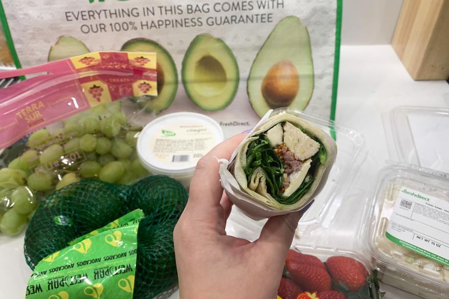 A bag and box of Fresh Direct groceries