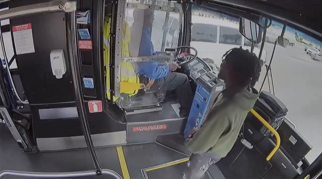 Oklahoma City passenger Tihron Harrison berates bus driver. 