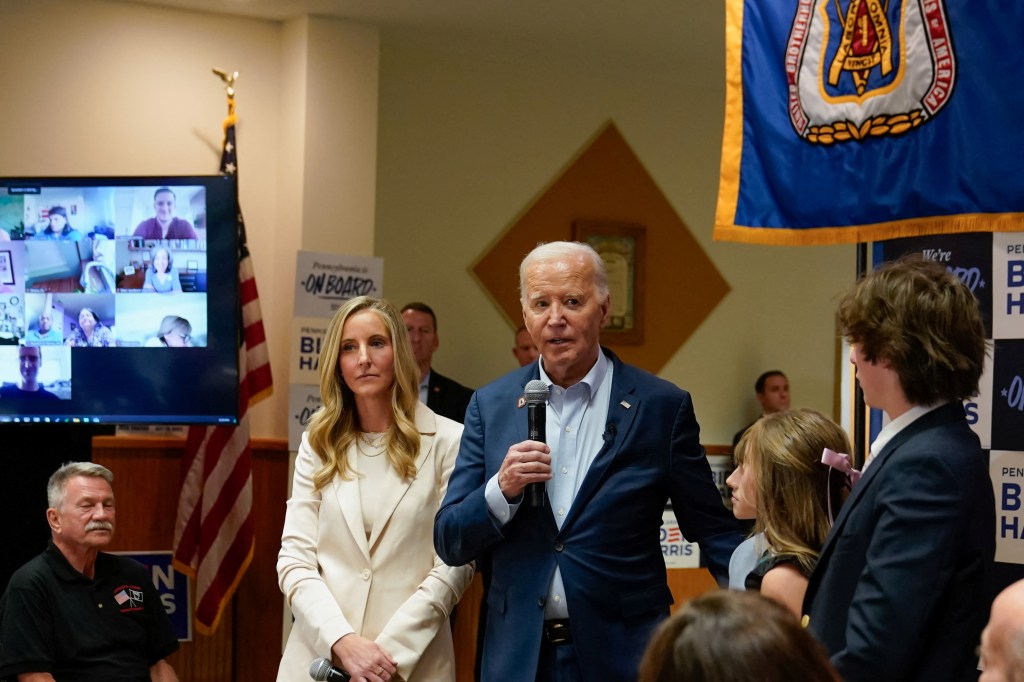 U.S. President Joe Biden speaking at a campaign event in Scranton, Pennsylvania, with supporters, volunteers and female athletes, advocating for their increased pay.