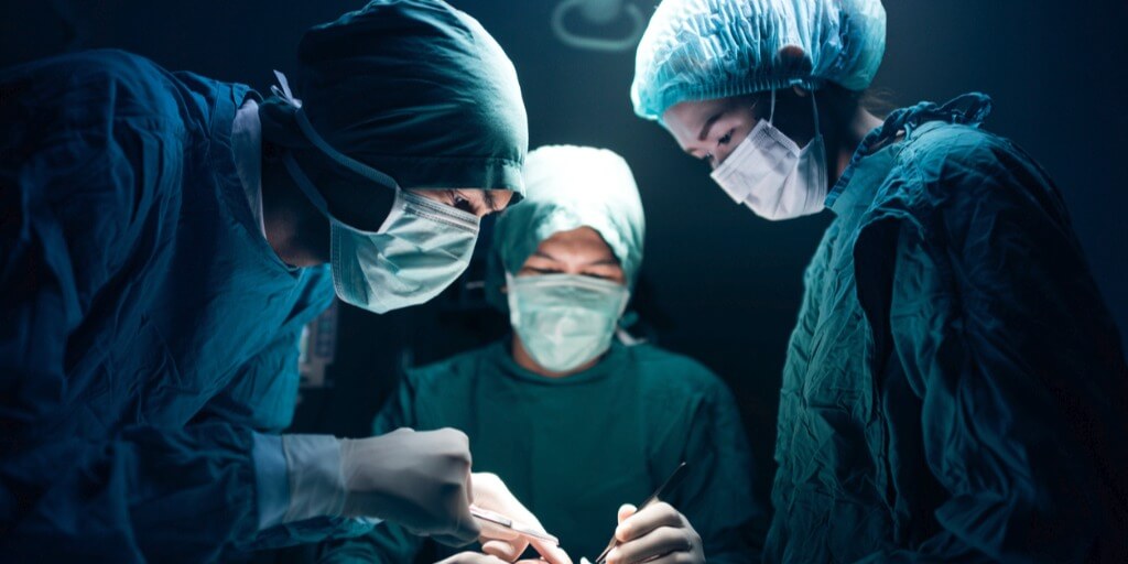 medical-team-performing-surgery-picture-id498861644.jpg