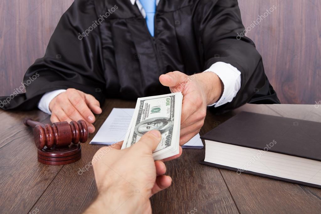 depositphotos_44590353-stock-photo-judge-taking-bribe-from-client.jpg