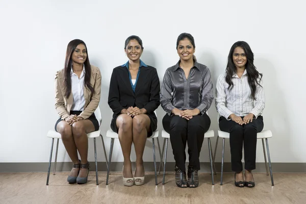 depositphotos_16896707-stock-photo-happy-indian-business-women-sitting.jpg