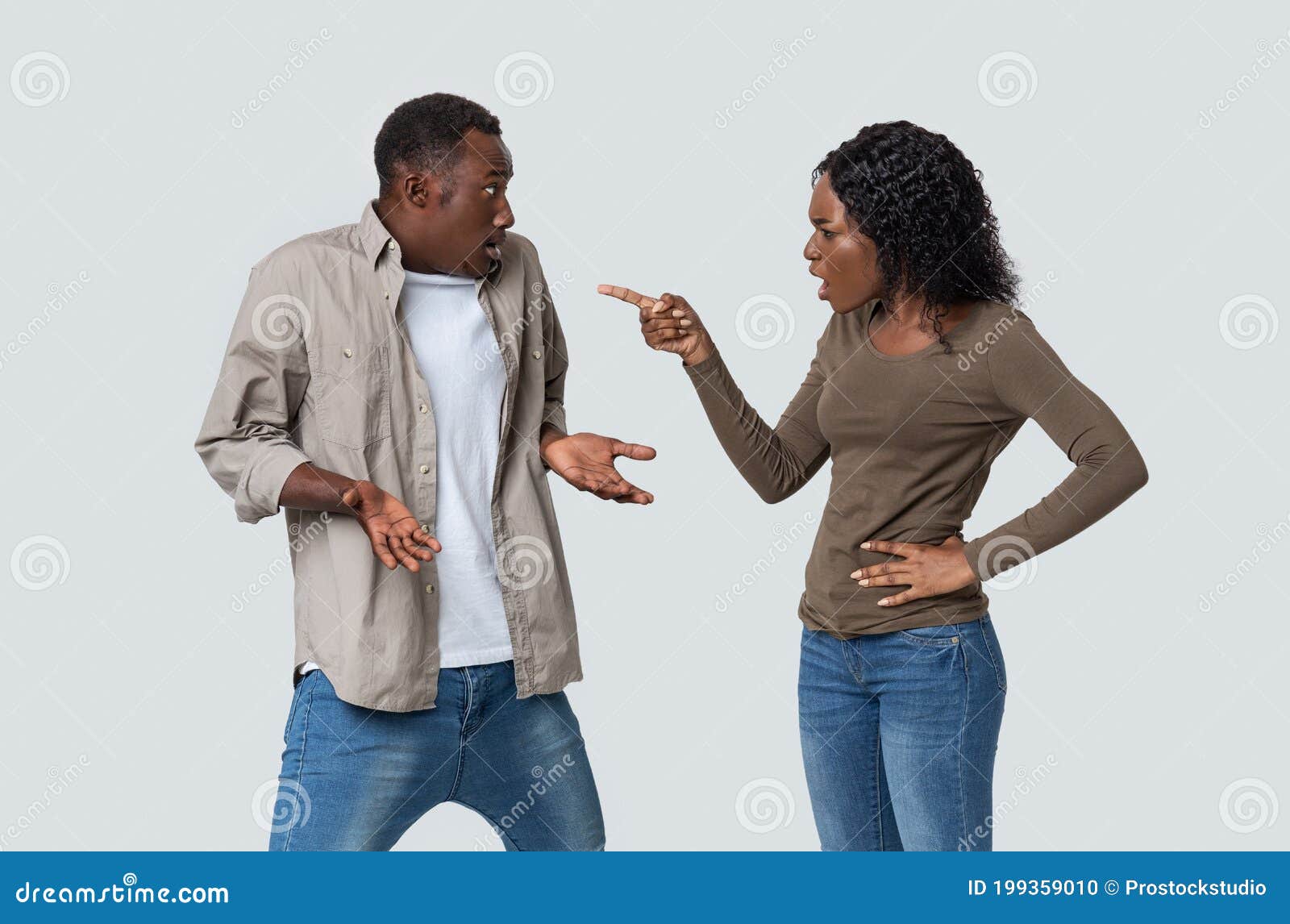 furious-african-american-young-woman-yelling-pointing-her-innocent-boyfriend-angry-black-lady-suspecting-husband-199359010.jpg