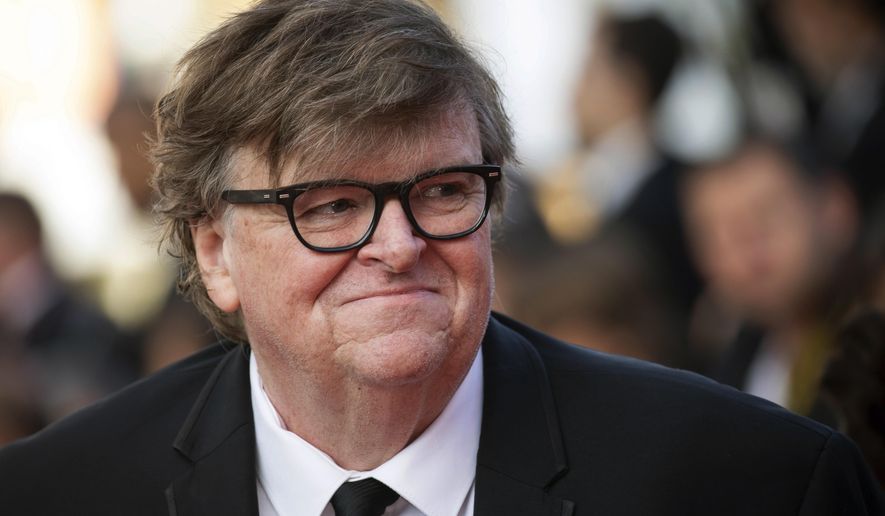  This May 25, 2019 file photo shows Michael Moore at the awards ceremony of the 72nd international film festival, Cannes, southern France. (Photo by Vianney Le Caer/Invision/AP, File)