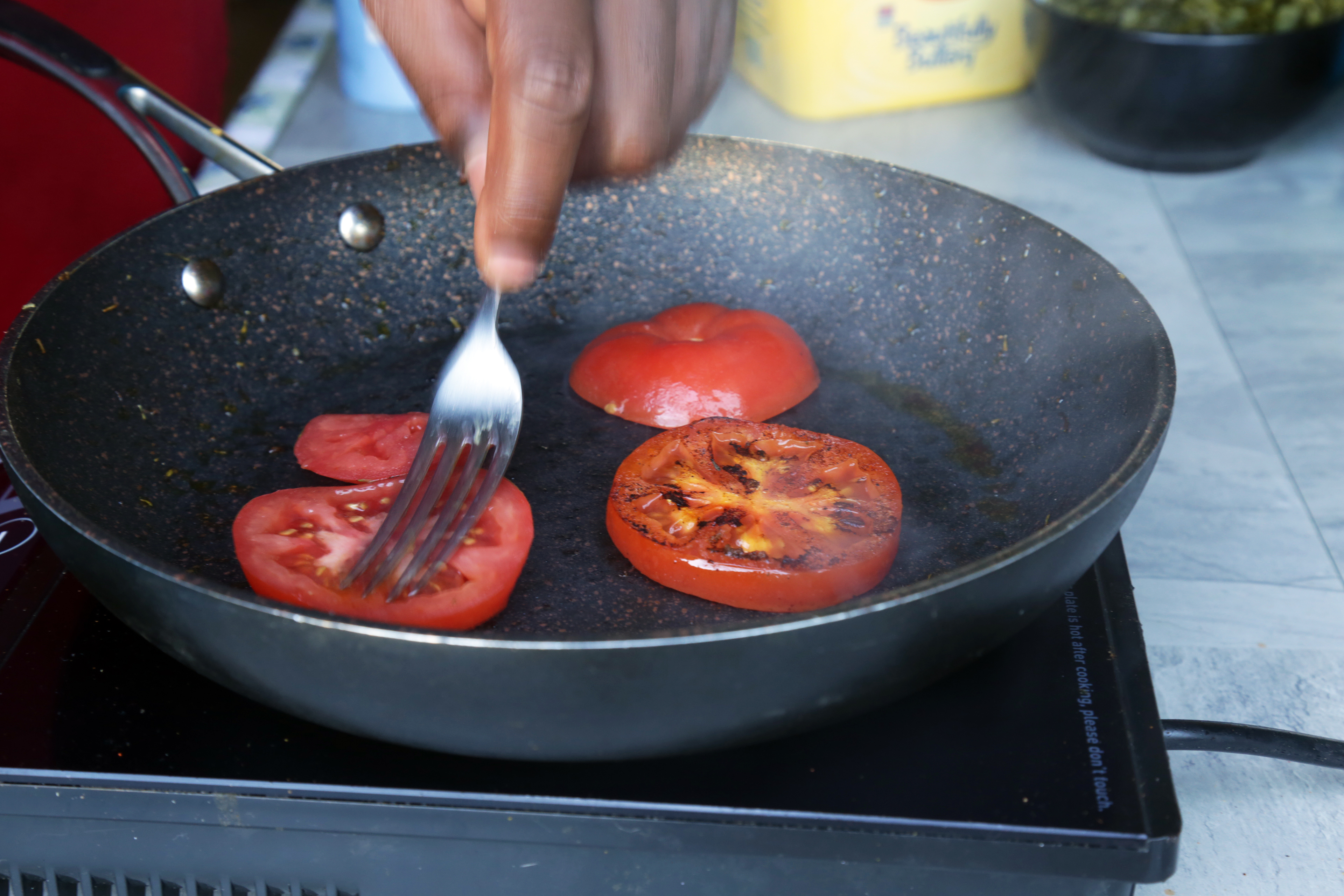 1539254264393-Cooking-tomatoes.jpeg