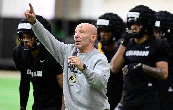 Charles Kelly is slated to make $850,000 in his first year as an assistant coach with Colorado. (Cliff Grassmick/Staff Photographer)