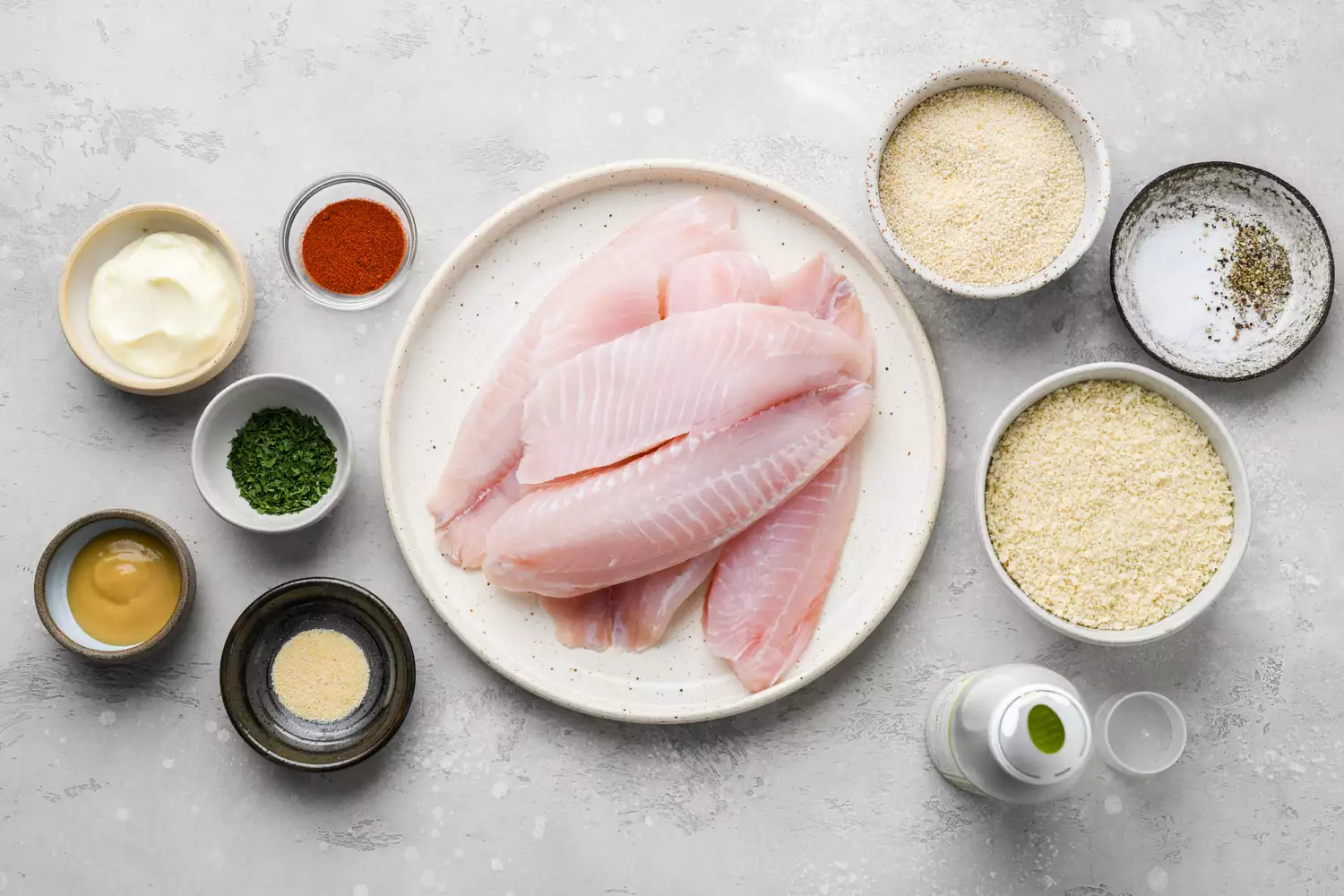 Ingredients for crunchy panko-crusted baked tilapia gathered